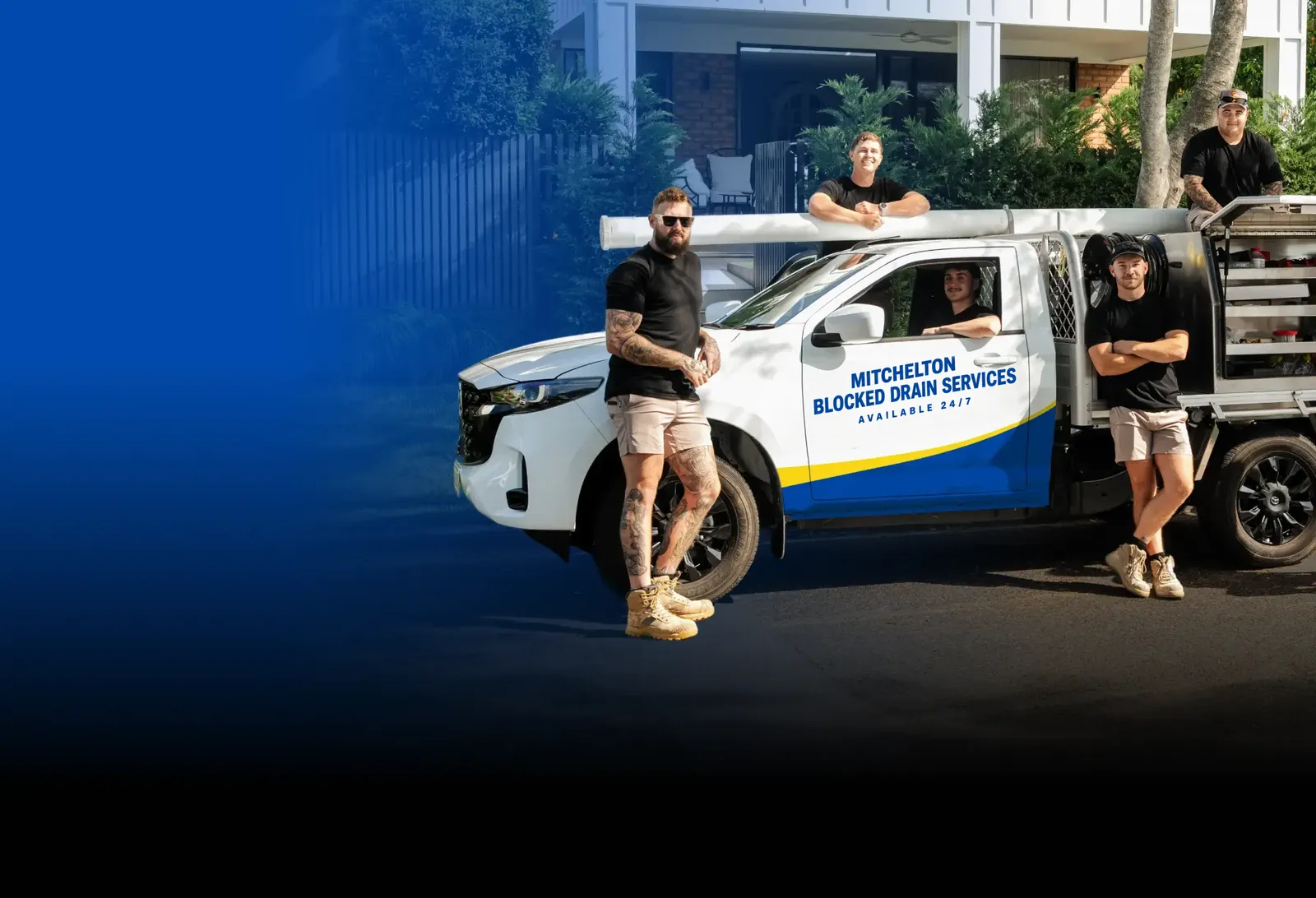 Mitchelton Blocked Drain Services team with the ute